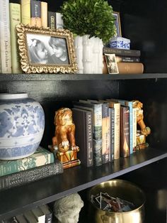 the bookshelf is filled with many different types of decorative items and decor on it