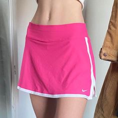 Pink Nike Tennis Skirt With Design! (Never Worn!) -Size:Xl (True To Size!) -First Photo Is A Reference Of How The Skirt Looks On Someone But The Rest Are The Actual Skirt With The Pattern! -Super Cute Skirt With Under Shorts And Has Such A Cute Pattern That’s Totally Unique ! -Let Me Know If You Wanna Buy!! #Skirt #Nike #Y2k #Athletic #2000’s Y2k Style Lined Skort, Nike Fitted Tennis Skirt For Spring, Sporty Pink Mini Skirt For Summer, Nike Mini Tennis Skirt For Spring, Nike Stretch Tennis Skirt With Lined Skirt, Nike Lined Mini Skirt For Spring, Stretch Nike Tennis Skirt With Lining, Nike Stretch Lined Tennis Skirt, Nike Stretch Tennis Skirt With Lining