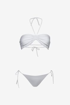 The Shell bikini by Sara Cristina features a seamless top with no hardware for a second-skin fit. It is adjustable at the back and the neck. It is accompanied by our classic string bikini bottom. 80% Polyamide, 20% ElastaneMade in USAModel is 5'7" (170cm) and wears a size S Beyonce Bathing Suit, Cute Swimwear, Luxury Swimsuits, Swimsuit Inspo, Tropical Bikinis, Seamless Top, White Bikinis