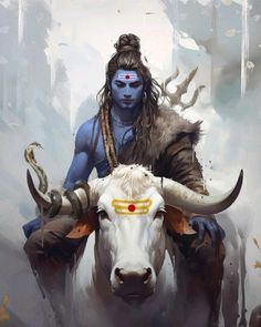 a man riding on the back of a bull with horns and eyes painted blue in front of him