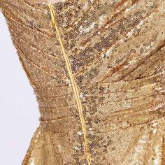 Add a touch of sparkle and elegance to your day with our One Shoulder Gold Sequin A Line Maid of Honor Bridesmaid Dress. This dress is perfect, for those looking to bring glamour to their party ensuring the wearer not looks beautiful but also creates lasting memories.

Elegant Design & Timeless Charm

Carefully crafted with attention to detail this dress features an one shoulder sleeve design that blends style with classic grace. The scoop neckline beautifully accentuates the face and neck addin Sparkling Evening Dress With Sweetheart Neckline For Party Season, Glamorous Glitter Evening Dress With Sweetheart Neckline, Glitter Evening Dress With Sweetheart Neckline For Wedding, Evening Sequin Dress With Sweetheart Neckline And Glitter, Glitter Dress With Fitted Bodice For Wedding, Elegant Gold Sequin Dress For Prom, Gold Sequin Prom Dress For Gala, Gold Sequin Dress For Prom And Gala, Holiday Bridesmaid Evening Dress