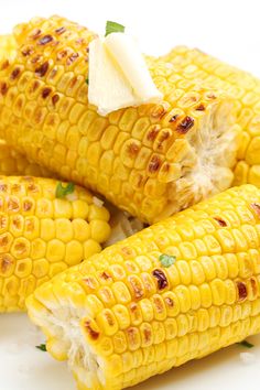 grilled corn on the cob with butter and parmesan cheese