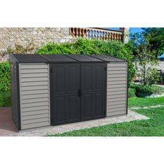 an outdoor storage shed with the doors open