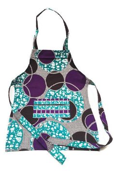 an apron with purple and blue circles on it