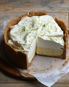 there is a pie on the table with one slice cut out and ready to be eaten