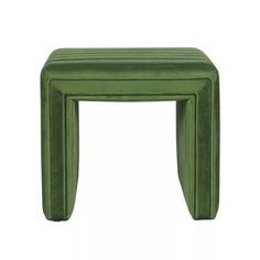 a small green stool with two legs and a square design on the top, sitting in front of a white background