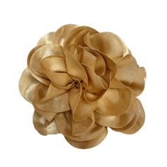 a gold flower on a white background