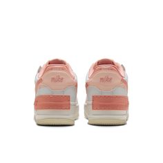 The Nike Women’s Air Force 1 Shadow in “Washed Coral” is a clean and casual sneaker with a fun twist. The white leather upper is given a pink wash, making it the perfect shoe to wear on any day. With an exaggerated foam midsole and lightweight rubber outsole, this sneaker is sure to keep you comfortable all day long. Nike Air Force 1 Shadow, Air Force 1 Shadow, White Coral, Round Toe Heels, Pink Quartz, Perfect Shoes, Nike Air Force 1, Stylish Sneakers, Coral Pink