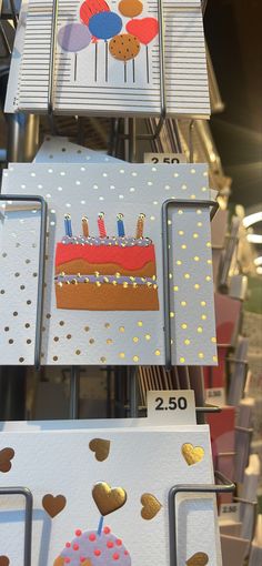 birthday cards displayed in a store window