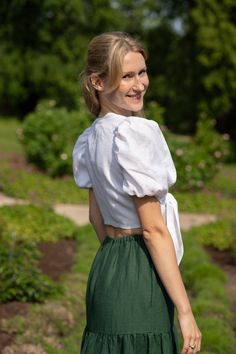 Meet our charming Puffy Sleeve Linen Blouse with Front Tie Closure - a harmonious blend of elegance and nature-inspired design. This beautiful top is crafted for the feminine, nature-loving woman who values both style and comfort. PRODUCT FEATURES * Oeko-Tex certified 100% local washed linen * V neckline * Puffy sleeves * Front tie closure * Not see-through (double fabric layer) FIT DETAILS * Model is wearing a size US S * Model height is  5'10" / 178 cm * Before placing an order, select the siz Puff Sleeve Blouse For Garden Party, Fitted Short Sleeve Blouse For Garden Party, Feminine Nature, Layered Fits, Linen Crop Top, Linen Crops, Summer Linen, Fit Details, Nature Inspired Design