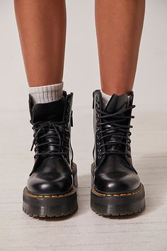 **Fit Note:** If in between whole sizes, we recommend sizing down. The original Dr. Martens 8-eye boot is reimagined with a bold chunky platform but stays true to the classic style featuring an iconic rubber air-cushioned sole and yellow stitching. * Smooth leather * Grooved sides * Side zipper closure * Goodyear Welt design, upper and sole are sewn together * Slip resistant | Dr. Martens Jadon Lace-Up Boots at Free People in Black, Size: US 6 Fall Streetwear Moto Boots With Reinforced Heel, Fall Streetwear Boots With Padded Ankle, Padded Ankle Boots For Streetwear In Fall, Fall Streetwear Boots With Zipper Closure, Fall Streetwear Boots With Zipper, Ankle-high Boots With Leather Footbed For Streetwear, Fall Streetwear Boots With Lug Sole, Winter High Ankle Platform Boots With Vibram Sole, Trendy Winter Boots With Vibram Sole