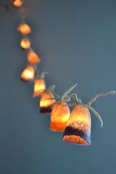 a string of lights hanging from a wall