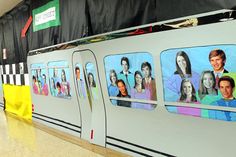 a subway car with pictures of people on it