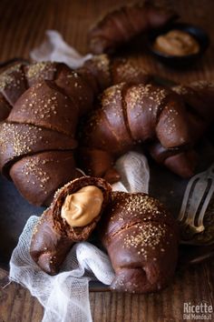 chocolate croissants with peanut butter spread on top