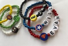 "Child's Personalized Super Hero Bracelet - Order with or without name. Each bracelet is made with 4mm seed beads, silicone \"hero\" bead and letter beads if ordering with name." Hero Bracelet, Pulseras Kandi, Boys Bracelets, Polymer Clay Bracelet, Huntsville Alabama, Clay Bracelet, Beads Bracelet Design, Letter Beads, New Market