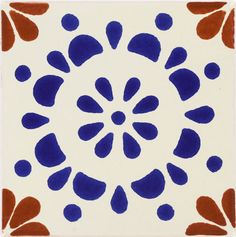 a blue and red flower design on a white tile wall with the words terra fe written below it