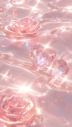 pink roses floating on top of water with diamond hearts in the middle and light reflecting off them