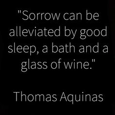 a black and white photo with a quote from thomas acunas on it that says,'sorow can be alleviated by good sleep, a bath and a glass of wine