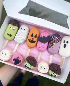 a box filled with halloween treats on top of a table