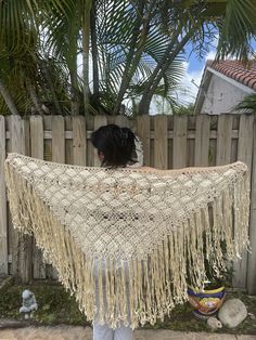 Ecru Ribbon Shawl. This is a lovely hand knotted ribbon shawl with long fringe. This ribbon shawl is made in a triangular form. A large amount of work went into making this lovely shawl. I believe that this type of ribbon shawl is of Spanish origin. Color: Ivory/ecru Material: I believe that this ribbon shawl is made of silk. We can usually save you money on combining items for shipping, so if you are purchasing multiple items please PUT THE ITEMS IN YOUR CART AND THEN DO THE BUY IT NOW - then y Luxury Cream Bohemian Shawl, Bohemian Beige Wrap Shawl, Bohemian Beige Shawl Scarf, Brown One-size Shawl Wrap, Winter Cape, Bohemian Hand-knitted Shawl Wrap, Long Fringes, Long Fringe, Color Ivory