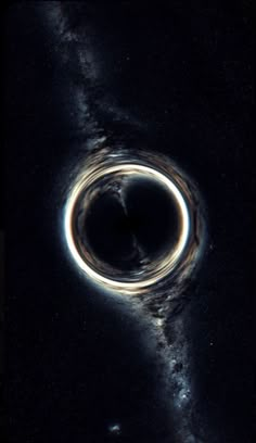 a black hole is shown in the sky with stars around it and an object that looks like a ring