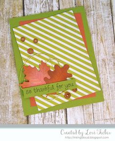 a card with some leaves on it