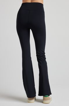 These leggings feature a high-rise waistband and a flirtatious flare below the knee, evoking memories of carefree days. Crafted from our high-performance SculptLux fabric, they wrap you in a luxurious second-skin embrace, offering support that allows you to move gracefully through life's every step. At LOSANO we help elevate every moment with clothing that is better for you! High waist Bootcut flare Sculpting Moisture wicking UV protective PFA Free BPA free Made from sustainable materials Oeko-t Black Wide Leg 4-way Stretch Leggings, Fitted Full Length Activewear With Contoured Waistband, Black Wide Leg Leggings With 4-way Stretch, High Stretch Elastane Flare Activewear, Black Flare Yoga Pants Athleisure, Black Flare Athleisure Yoga Pants, Black Flare Athleisure Activewear, Black Flare Activewear Athleisure, Black Flare Yoga Pants In Athleisure Style