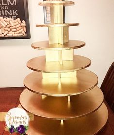 there is a cake stand made out of wine corks