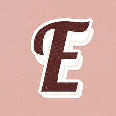 the letter e is made up of red and white stickers on a pink background