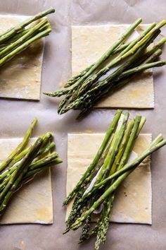 asparagus and ravioli are laid out on wax paper