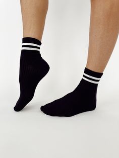 Our Varsity Socks are knit with ribbed and striped styling for a comfortable, casual, and athleisure look. With an ankle-length design for a trendy finish, these varsity socks bring the perfect combination of fashion and function. Casual Striped Socks For Spring, Casual Socks With Ribbed Cuffs For Fall, Casual Striped Sports Socks, Casual Fall Socks With Ribbed Cuffs, Trendy Striped Socks For Spring, Trendy Black Sports Socks, Winter Sporty Socks With Ribbed Cuffs, Sporty Winter Socks With Ribbed Cuffs, Trendy Sports Socks For Spring