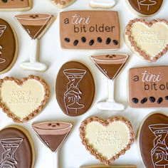 decorated cookies arranged in the shape of martinis, cocktail glasses and heart shaped cookies