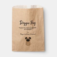 a brown paper bag with a pug on it's side and the words doggie bag written in black ink