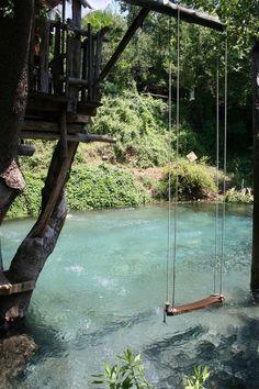 there is a swing set in the water