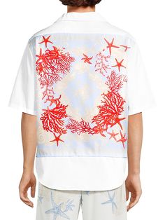 "Find VERSACE Poplin Embroidered Short-sleeve Shirt on Editorialist. Crafted of Italian cotton poplin, Versace's buttoned shirt is styled with short sleeves and tonal seashell embroidery at the chest pocket. Camp collar Short sleeves Chest patch pocket Button-front closure 100% cotton Contrast: 100% silk Dry clean Made in Italy SIZE & FIT Model measurements: 6'2\" tall, 40\" chest, 31\" waist Model is wearing a US size 40 ABOUT THE BRAND Founded in 1978, Versace is instantly recognizable by the signature Medusa head logo, chosen by founder Gianni Versace for its Greek symbolism. The Italian label is known for its luxe, bold clothing, sneakers, shoes and accessories-think gilding, oversized logos and punchy prints. Since taking over artistic direction, Gianni's sister Donatella Versace has Seashell Embroidery, Bold Clothing, Buttoned Shirt, Pocket Camp, Medusa Head, Donatella Versace, Embroidered Shorts, Gianni Versace, Button Shirt