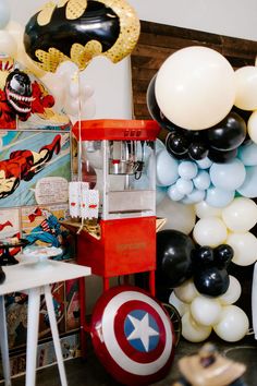 balloons and decorations are on display at a birthday party