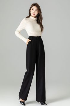 "These black Warm Wool Long Pants are the perfect addition to any wardrobe! They will keep you warm, while still being stylish. These pants feature a straight leg, a smooth lined trouser, and a functional front pocket. They can be paired with any number of tops included sweaters, blouses, button downs, etc. Make more fashion forward choices with these pants!   DETAIL * 30% wool, 30% fiber, 40% polyester * Two front pockets * Wide leg Long pants * Front button closure  * High waist Pants * Perfect for autumn,winter * Wash by hand or machine with cold water * More color:  https://etsy.me/3P1h3QP MODEL SIZE Bust 85 cm(33.4\")  Waist 67 cm(26.7\")  Height 168cm (5' 6\") She wears size XS Choose CUSTOM Order if you * Need a better fit * Can't find your size in our size Chart * Chang the Length Black Full-length Bottoms For Winter, Winter Outfits With Pants, Wool Pants Women, Winter Full-length Dress Pants For Office, Elegant Wide-leg Winter Pants, Winter Full-length Wool Pants, Black High-waisted Wool Wide Leg Pants, Black Wide Leg Pants Outfit Casual, Black Wool Pants