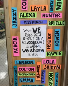 a bulletin board that has been decorated with words and phrases for the door to school