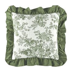 a green and white pillow with ruffled edges