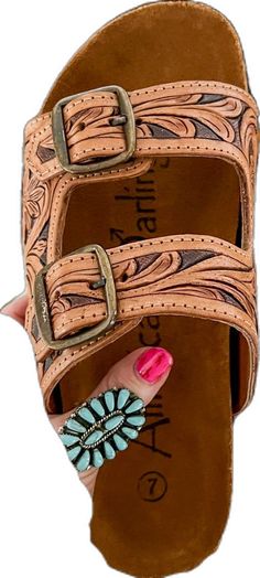 Open Toe Mules With Leather Lining For Vacation, Vacation Open Toe Mules With Leather Lining, Hand Tooled Open Toe Sandals For Spring, Leather Mules With Buckle Closure For Beach, Leather Slip-on Wedge Sandals With Buckle Closure, Adjustable Mules With Buckle Closure, Double Strap Leather Footbed Sandals, Summer Hand Tooled Sandals, Leather Slides With Heel Loop