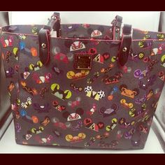 a handbag with many different designs on it