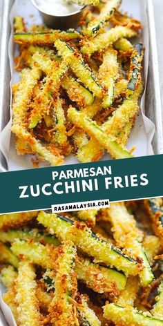 zucchini fries with parmesan cheese on top and sauce in the middle