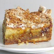 a piece of food sitting on top of a white plate