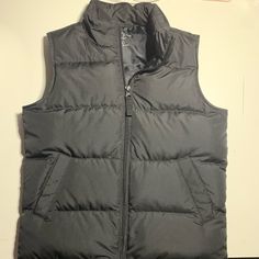 Black Lands End Vest. Zips Up And Has Pockets. Never Worn!! Super Cute!! Black Winter Vest With Pockets, Black Winter Vest For Outdoor Activities, Black Outdoor Vest For Fall, Winter Black Vest For Outdoor Activities, Black Vest For Winter Outdoor Activities, Black Vest For Outdoor Activities In Fall, Black Vest For Fall Outdoor Activities, Black Vest For Outdoor Fall Activities, Black Winter Vest For Cold Weather