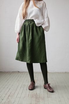 Below the knee skirt is made from 100% soft and washed linen. This Petticoat is perfect for wearing under dress or other skirt or can be worn alone. Match it with our tunics! Details: - Composition: 100% Oeko-Tex certified linen - Colour: forest green - Elastic waist - Pockets - Medium weight linen - Linen care: machine wash gentle; tumble dry low, ironing optional - The price is for one skirt, other pictured items are not included Green Linen Skirt Outfit, Fitted Linen Mini Skirt, Green Linen Relaxed Fit Skirt, Linen Green Lined Skirt Bottoms, Green Linen Lined Skirt Bottoms, Relaxed Linen Mini Skirt, Relaxed Linen Skirt With Elastic Waistband, Spring Linen Skirted Bottoms, Relaxed Fit Linen Mini Skirt