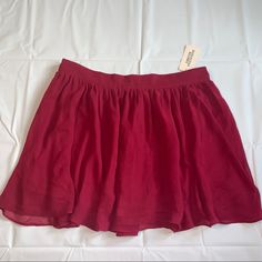 Brand: Forever 21 Size: Large Color: Burgandy Style: A-Line, Tulle, Fit-N-Flare, Circle, Skater Skirt Condition: Excellent Pre-Owned, Nwt Never Worn - 1-2 Thread Pulls From Storage - Can’t Tell Unless Looking Up Close :) Additional Details: Super Cute Burgundy Skirt, Slightly Flared With Double Layer Great For Summer My Time Capsule Collection Items Purchased 2000-2016 Packed Well And In Storage Since 2016 Forever 21 Used To Have Much Higher Quality Back Then!! All Of These Are Sold Out Styles A Red Flowy Casual Skirt, Forever 21 Flowy Mini Skirt, Casual Flared Mini Skirt For Date Night, Casual Red Skirt By Forever 21, Casual Red Skirt From Forever 21, Flowy Red Mini Skirt With Elastic Waistband, Red Skirt For Date Night In Summer, Flowy Skirted Skort By Forever 21, Casual Burgundy Summer Skirt