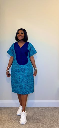 Be fashionably adorned in this gorgeous shift dress with  side pockets and made with 100% African wax cotton As always our designs are fully handmade, comfortable and perfect fit to suit all body types. Please feel free to inform us about any customization options or preference.  We will proceed with selected standard UK  / customized size within 12 - 24hours of purchase Model is wearing size 8 (Small) Please DM your custom measurement if you have it. Waist Bust Length  Round Arm   Please see ou Ankara Shift Dresses For Women, Ankara Free Dresses For Women, Cotton Shift Dress With V-neck, Cotton V-neck Shift Midi Dress, Blue Cotton Midi Dress With Pockets, Blue Cotton Shift Dress, Blue Cotton Dress With Pockets, Blue Cotton Shift Midi Dress, Cotton Shift Midi Dress With Pockets