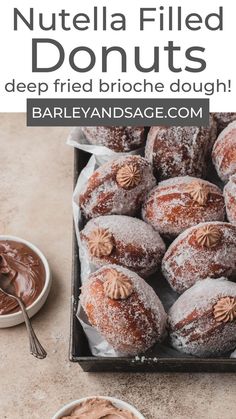 nutella filled donuts with chocolate frosting in a bowl and on the table