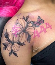 a woman with pink hair has a tattoo on her shoulder that reads ajax and is decorated with flowers