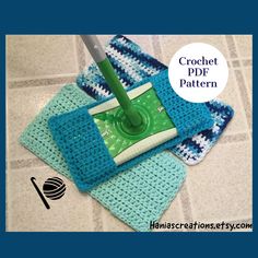 a crochet pattern for a mop and cleaning cloths on the floor